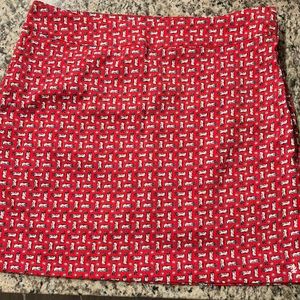Izod golf skort, golf bag and ball pattern, Red, tags on